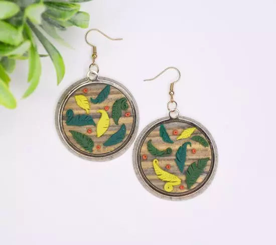 Decorative polymer clay finished piece displaying vibrant colors.