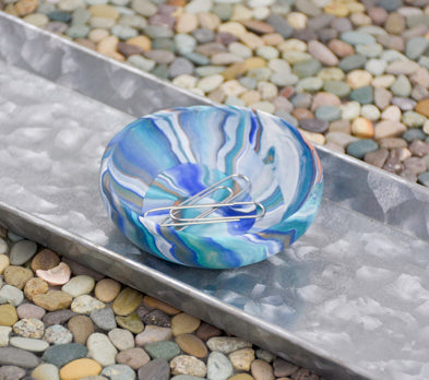 Blue Marbled Coil Dish with paper clips placed in it

