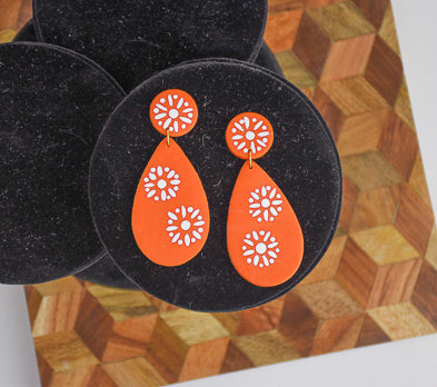 Orange Faux Ceramic Earrings with white detail