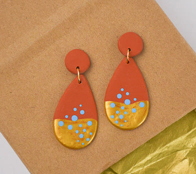 Terra Cotta Earrings with blue and gold detail

