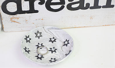 Glitter Stars Marbled Mini Dish with a wring placed on it
