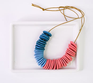 photo shows the final glamour image for Sculpey Premo™ Interchangeable Disk Necklace