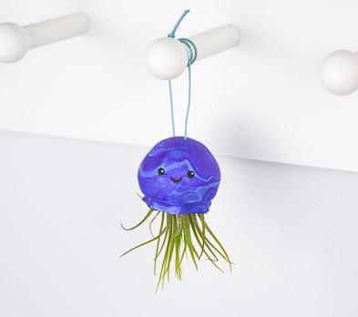 final image of  Sculpey Premo™ Metallic Jellyfish Air Plant Holder hand from a knob