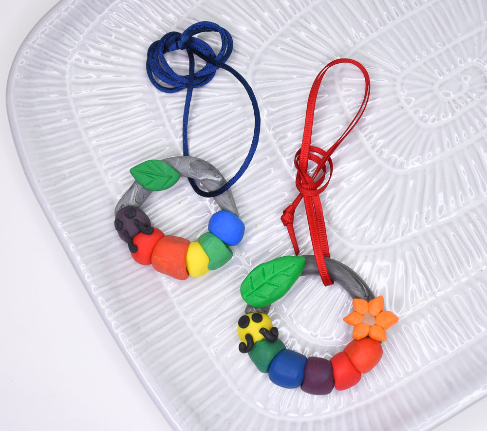 final image for Sculpey Bake Shop® Caterpillar Color Wheel Pendants